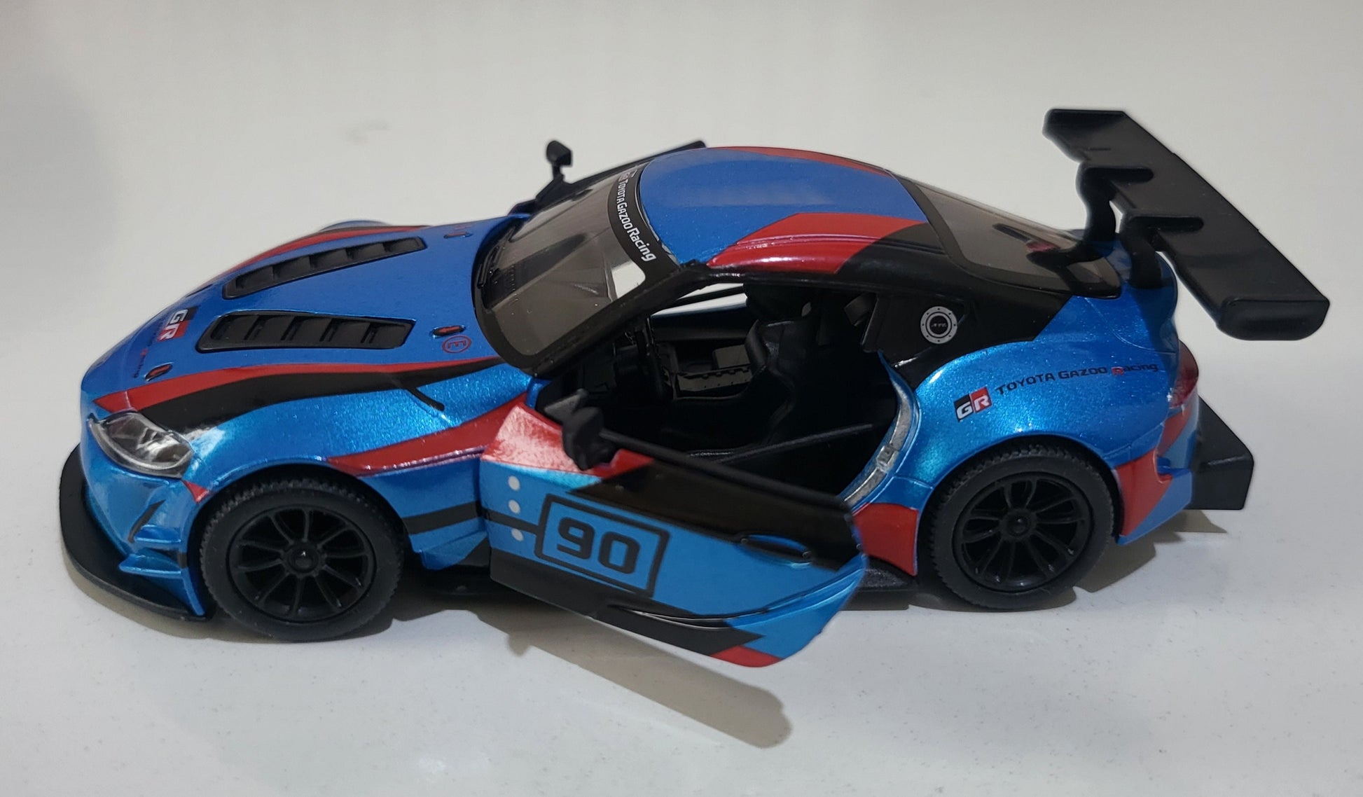 Toyota GR Supra Racing Concept 1:36 Diecast Model - Pull Back Action, Opening Doors, Collector, boy, girl, kids Gift with Display Sleeve