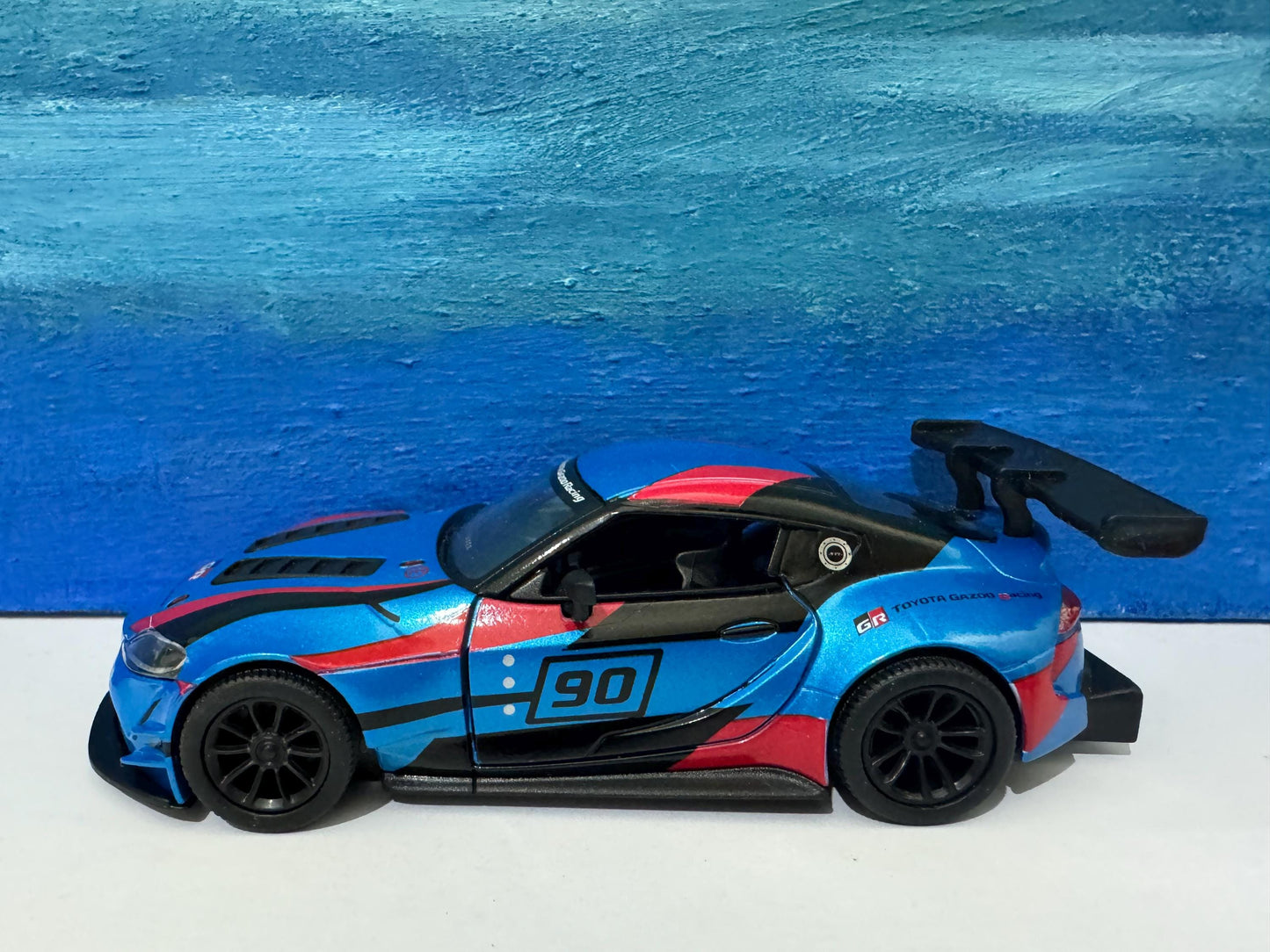 Toyota GR Supra Racing Concept 1:36 Diecast Model - Pull Back Action, Opening Doors, Collector, boy, girl, kids Gift with Display Sleeve