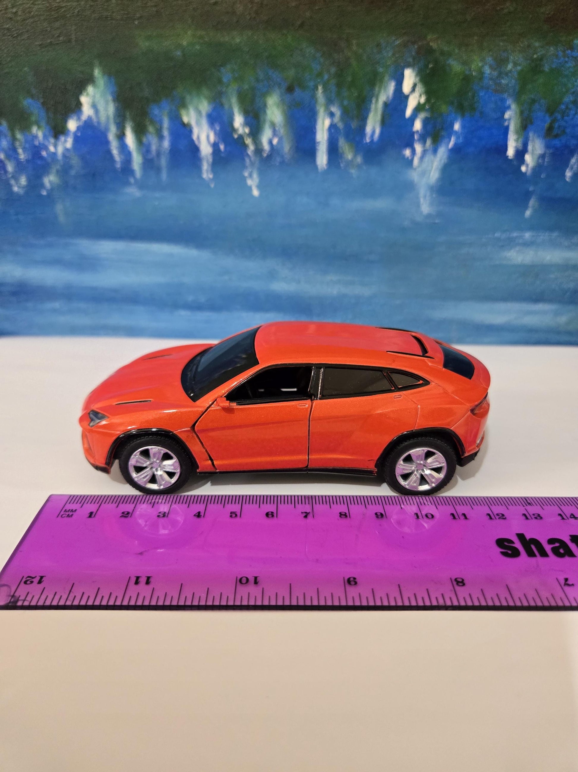 ORANGE Lamborghini Urus Personal Plate 1:36 Scale Model Car – Gift for Dad, Mom, Sister – Birthday Anniversary – Gift Sleeve Included