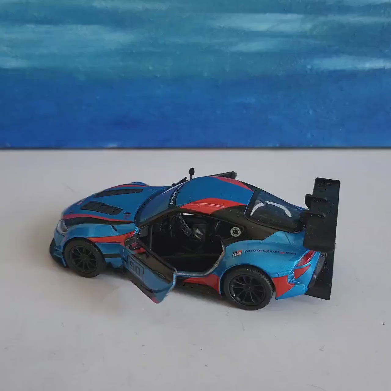 Toyota GR Supra Racing Concept 1:36 Diecast Model Car – Pull Back Action, Opening Doors, Collector Toy, Kids & Adults Gift, Sleeve Included